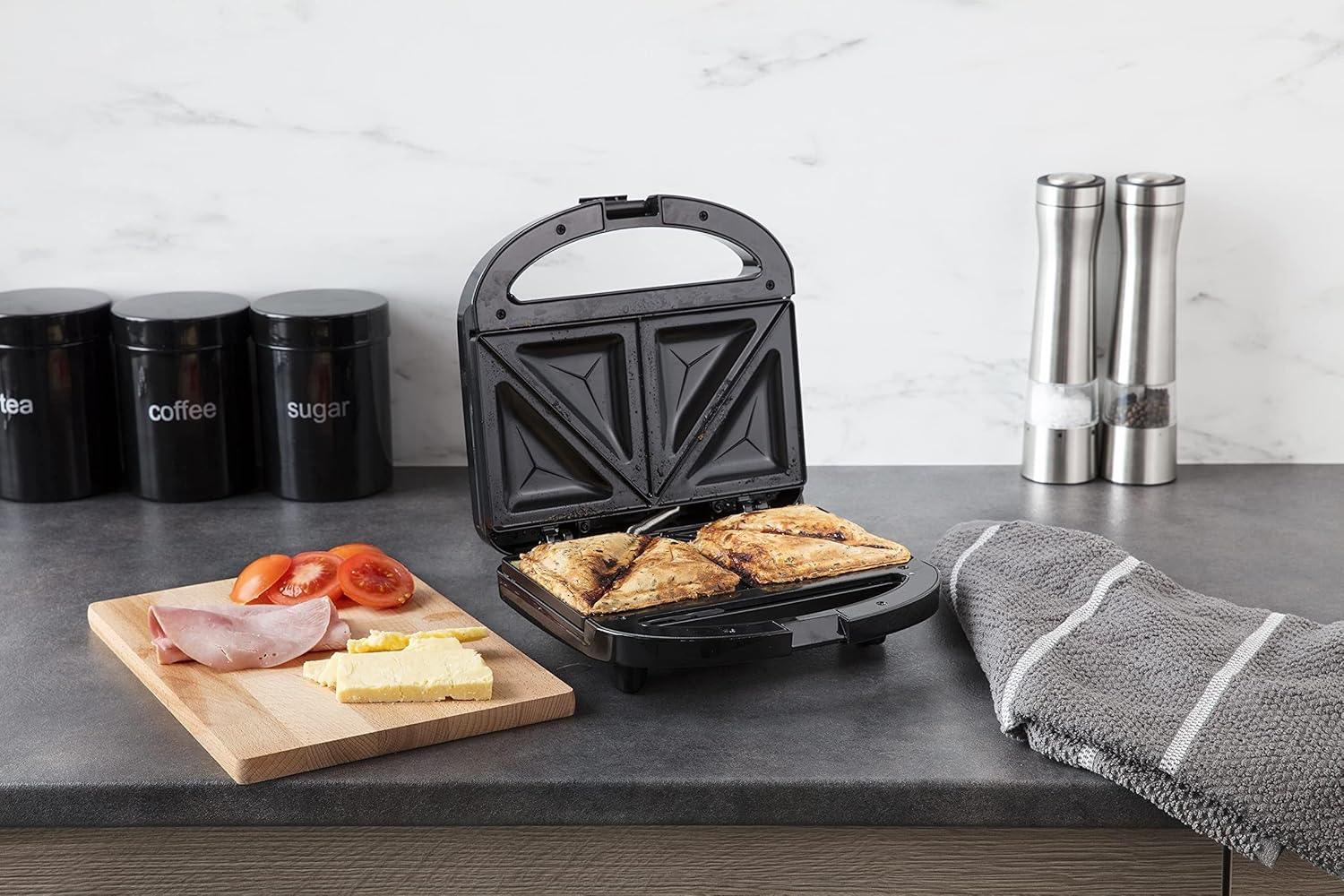 Russell Hobbs Sandwich Toaster/Toastie Maker – Makes 2 Toasties, Cuts and seals, Non-stick easy clean plates, Verticle storage, Power On & Heat ready lights, Handle with locking clip, 760W, 24520